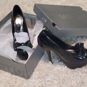 High heeled patent leather shoes